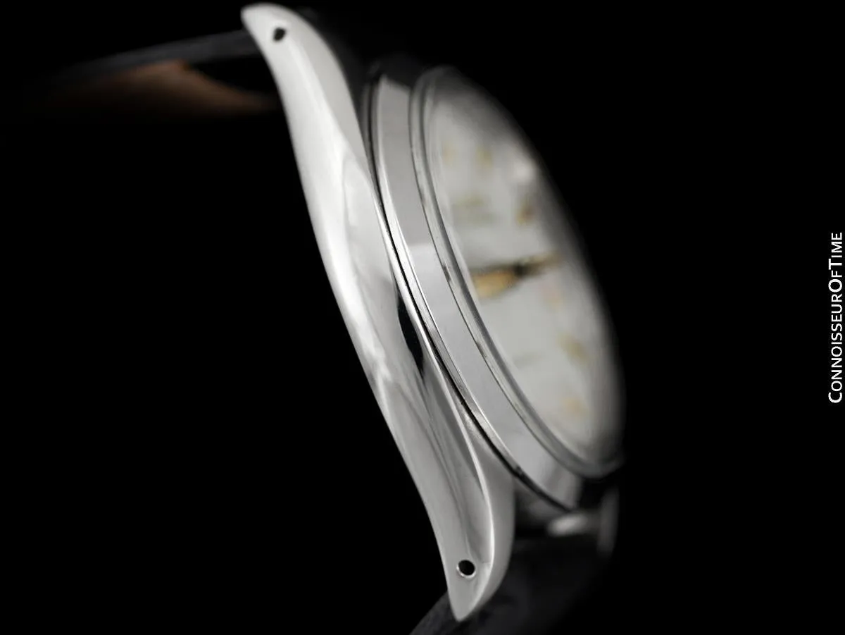 1956 Rolex Oysterdate Vintage Mens Handwound Watch with Roulette Date - Stainless Steel & 18K Gold