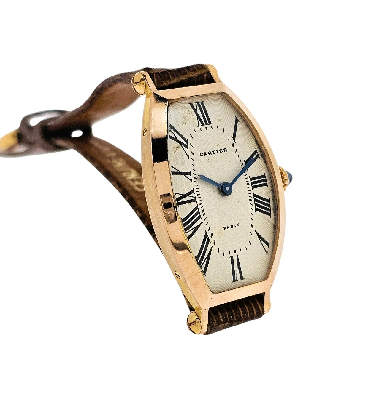 Cartier Paris Rose Gold Tonneau shaped watch that curves on the wrist.  Circa 1990's