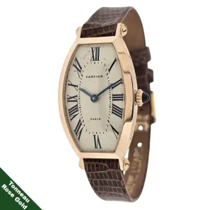 Cartier Paris Rose Gold Tonneau shaped watch that curves on the wrist.  Circa 1990's
