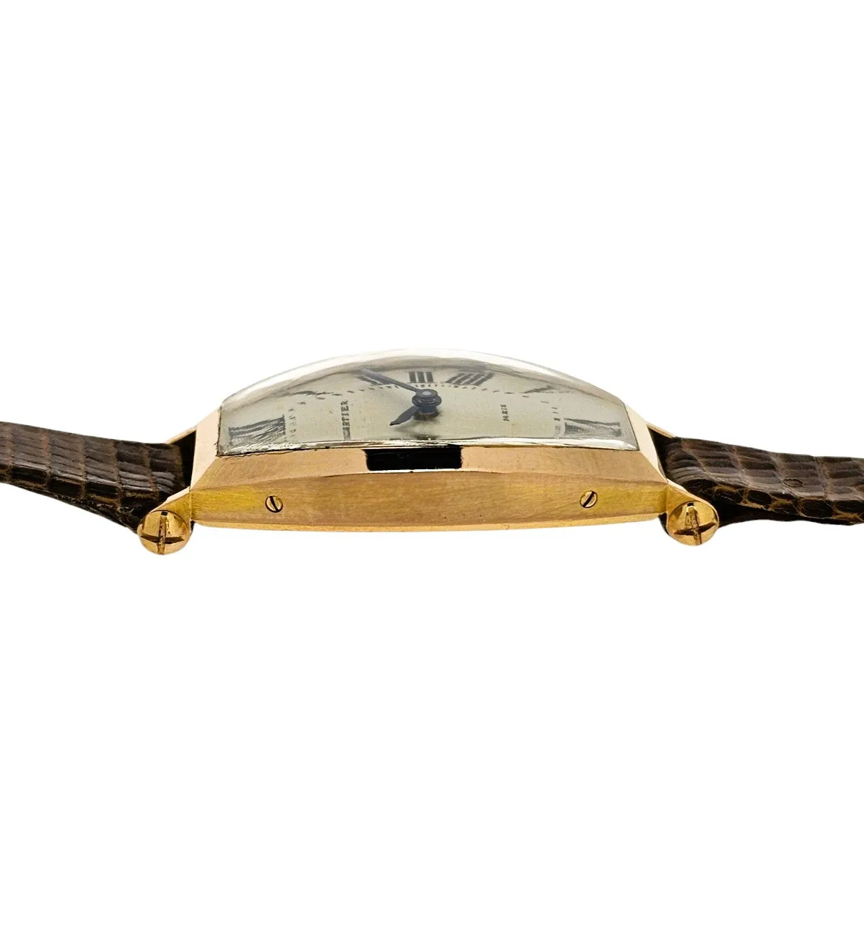 Cartier Paris Rose Gold Tonneau shaped watch that curves on the wrist.  Circa 1990's