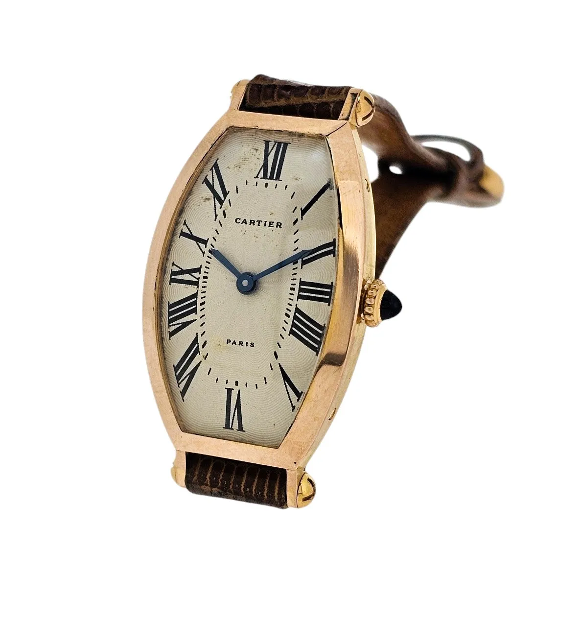 Cartier Paris Rose Gold Tonneau shaped watch that curves on the wrist.  Circa 1990's