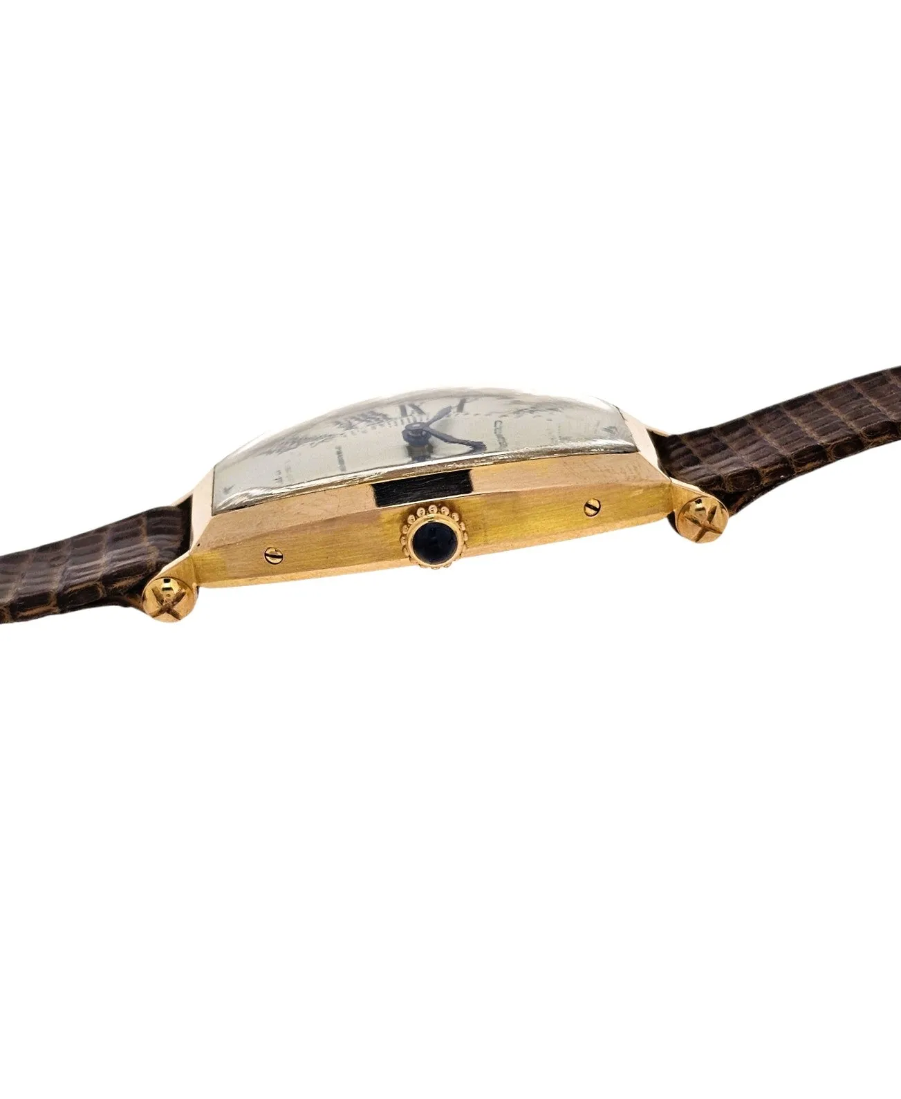 Cartier Paris Rose Gold Tonneau shaped watch that curves on the wrist.  Circa 1990's