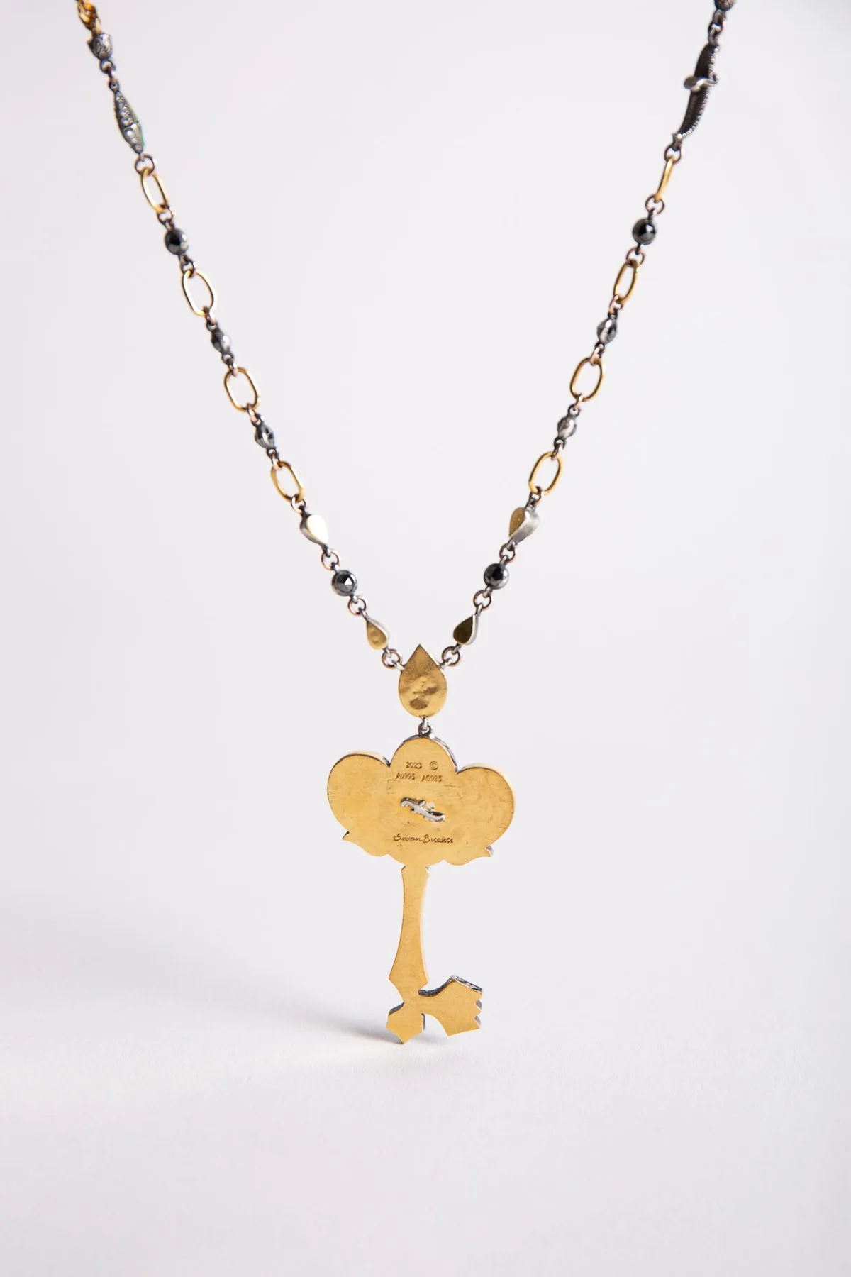 SEVAN BIÇAKÇI | 24K YELLOW GOLD, STERLING SILVER, DIAMOND, AND TANZANITE NECKLACE